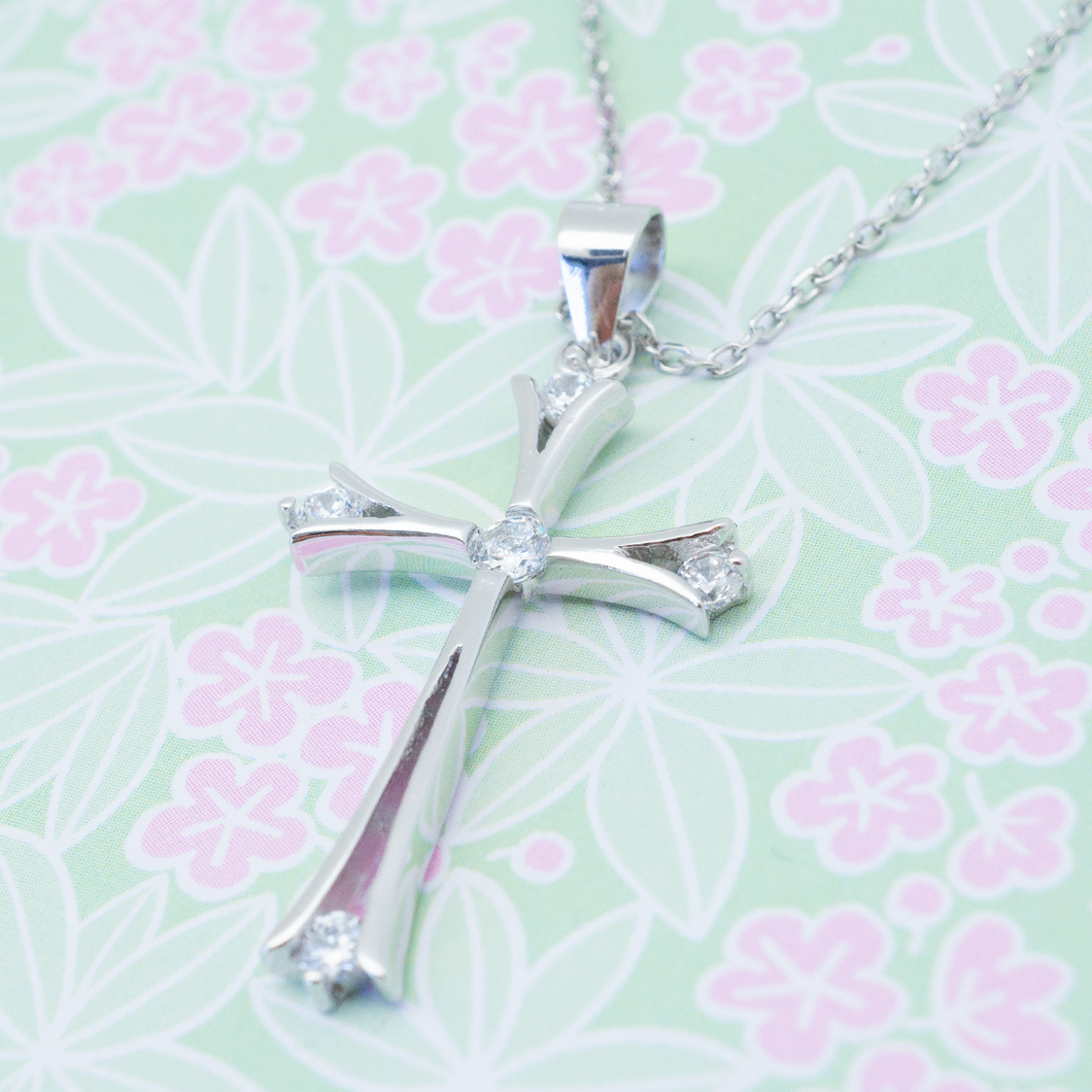 Collier croix 5 zirconiums en argent 925/000